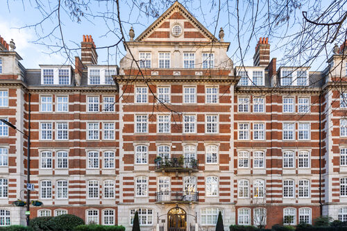 Edwardian red-brick mansion block with white stone detailing in London